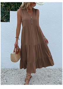 Detail of V-neck sleeveless brown tiered maxi dress with button accents for summer