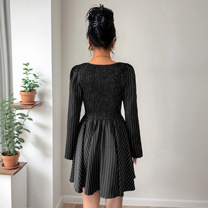 Elegant striped long sleeve dress with elastic smocked back and A-line skirt fit
