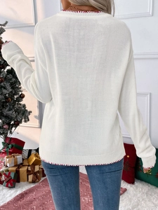 Women Christmas knit sweater in white with red stitching trim, viewed from the back