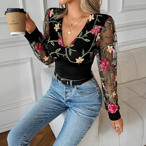 Women V-neck long sleeve lace T-shirt featuring floral embroidery and mesh sleeves