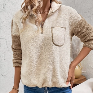 Women's sherpa fleece quarter-zip pullover in beige and tan patchwork with drawstring hem