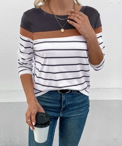 Detail of color-block striped long sleeve shirt with grey, brown and white patterns