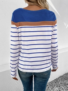 Detail of striped long sleeve top with blue and brown patchwork design on back