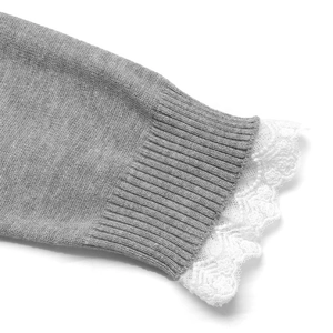 Grey long sleeve sweater with ribbed cuffs and elegant white floral lace detailing