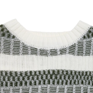 Close-up of the ribbed crew neck on a white and dark green striped knitted sweater