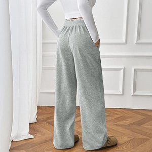 Women's high waist grey wide leg trousers in soft knit fabric with elastic waistband
