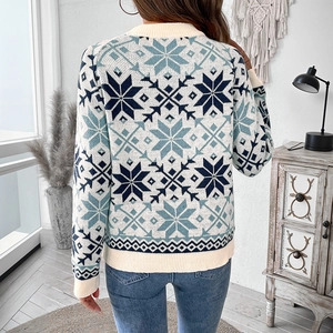 Women's Nordic Christmas sweater with blue snowflake patterns on beige knit fabric