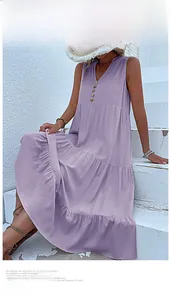 Detail of purple sleeveless V-neck maxi dress with tiered ruffle hem and button accents