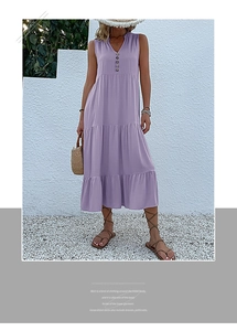 Detail of light purple tiered sleeveless maxi dress with wood button neck detail