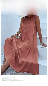 Detail of rust red V-neck sleeveless maxi dress with tiered skirt and button accents