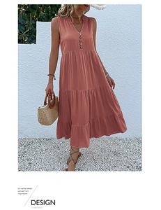 Detail view of V-neck sleeveless coral dress with vintage buttons and tiered skirt