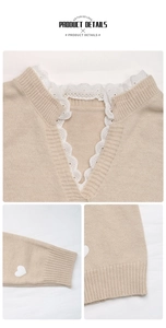Detail of V-neck lace patchwork and heart pattern on apricot knit sweater