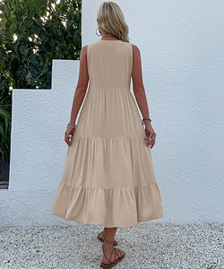 Rear view of a tiered khaki sleeveless maxi dress made from breathable cotton linen fabric