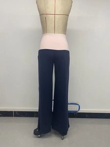 Detail view of contrast high waist pink waistband on brown wide leg lounge pants