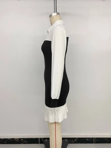 Detail of contrast patchwork long sleeve shirt dress with pleated hem and slim fit