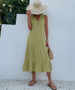 Detail of avocado green V-neck sleeveless maxi dress with buttons and tiered skirt