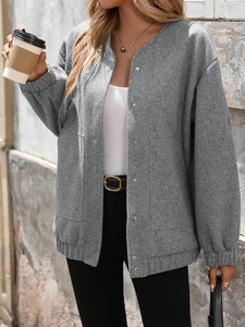 Women's grey oversized wool blend snap-button jacket with large pockets and ribbed cuffs