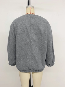 Back view of a grey stand-collar jacket with elastic hem and drop shoulder design