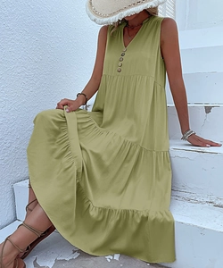 Detail of sage green tiered sleeveless maxi dress with V-neckline and buttons