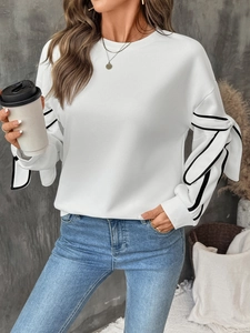 White crewneck sweatshirt with black contrast bow details on sleeves and ribbed cuffs