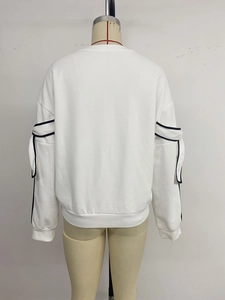 Rear view of white pullover sweatshirt featuring black contrast tape on long sleeves