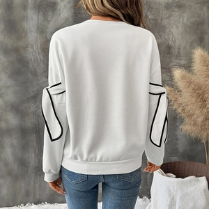 Women's white long sleeve sweatshirt with contrast side stripe detail, back view silhouette