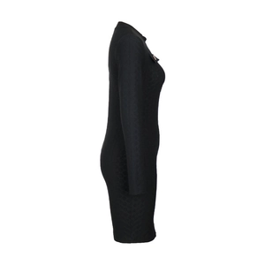 Close-up of black knitted bodycon dress featuring rhombus texture and gold button detail