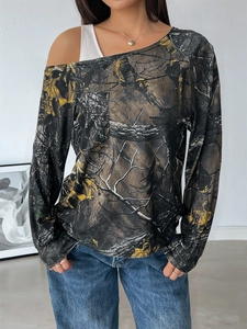 Detail view of women's off-shoulder camo top with faux layer and slim long sleeves