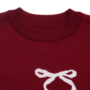 Women's wine red crewneck Christmas sweater with white bow jacquard pattern