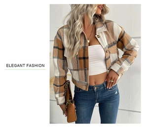 Detail of crop plaid shacket with dual chest pockets and button-front closure in beige tones