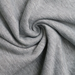 Close-up of premium gray heather knit fabric with soft texture for sweatshirt