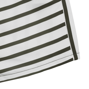 Close-up of black and white striped fabric with premium vertical border and clean stitching