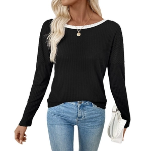 Women black knit sweater with white trim neck, backless bow design and long sleeves