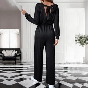 Women black long sleeve jumpsuit with deep V back bow detail and wide leg pants
