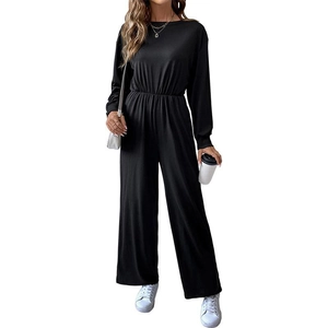 Elegant black long sleeve wide-leg jumpsuit with elastic waist and soft draping fabric
