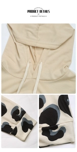 Detailed view of beige leopard print hoodie featuring ribbed cuffs and drawstring hood