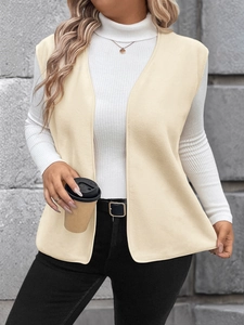 Detail of premium light beige fleece vest with soft texture and minimalist open front design