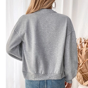 Back view of women's grey fleece cropped sweatshirt with ribbed hem and crewneck collar