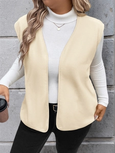 Close-up of cream polar fleece vest featuring a sleeveless open front casual design