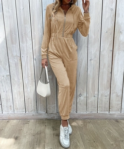Close-up of khaki hooded long sleeve jumpsuit with front zipper and elastic waist detail