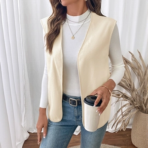 Chic cream fleece vest jacket for women paired with white turtleneck and blue jeans