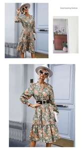Detail of V-neck floral dress with long sleeves and elegant ruffles in green