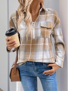 Detail of retro plaid long-sleeve shirt with zip-up lapel collar and brushed texture