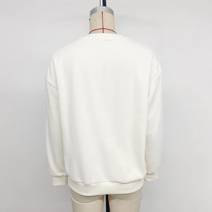 Back view of a cream long-sleeve sweatshirt with bow print and drop shoulders