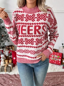 Detail of red and white knit Christmas sweater with Cheers lettering and Fair Isle patterns