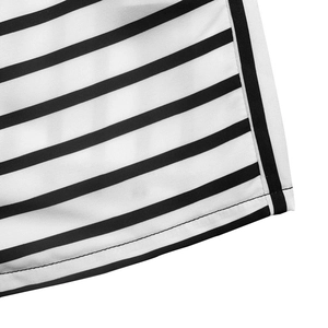 Detailed macro view of the black and white horizontal stripe pattern and fine stitching seams
