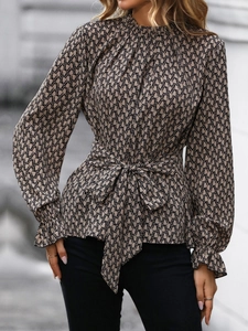 Detail of flared cuffs and chiffon letter print on this slim fit long sleeve blouse