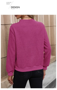 Back view of a long-sleeved plum sweatshirt with unique geometric twill embossed texture
