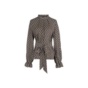 Detail of high neck ruffle collar and elegant chain print pattern on blouse