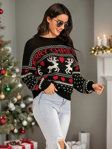 Detailed knit texture of Christmas reindeer pattern and Merry Christmas lettering on sweater